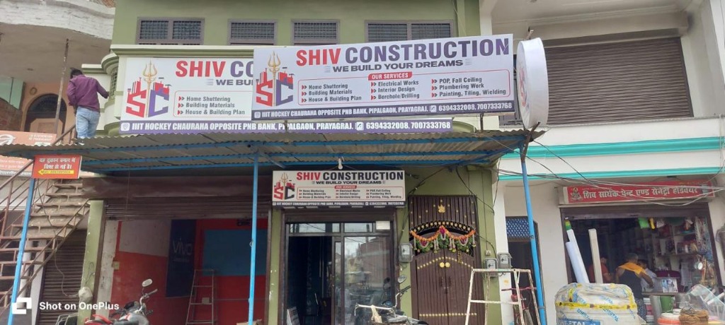 Shiv Construction office front exterior facade with active signage and main entrance