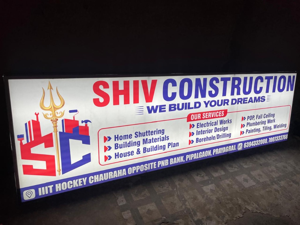 Shiv Construction Glowing Signboard at Night